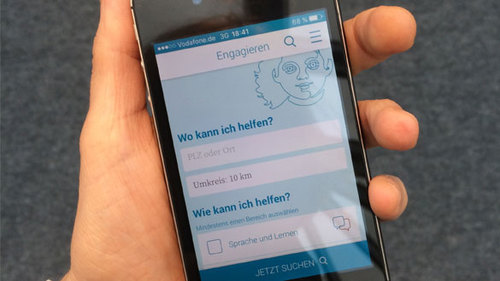 Bild: Smartphone mit App in Hand