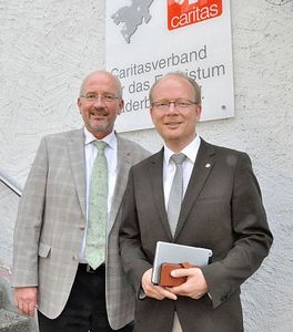 Bild: Zwei Männer in Anzügen